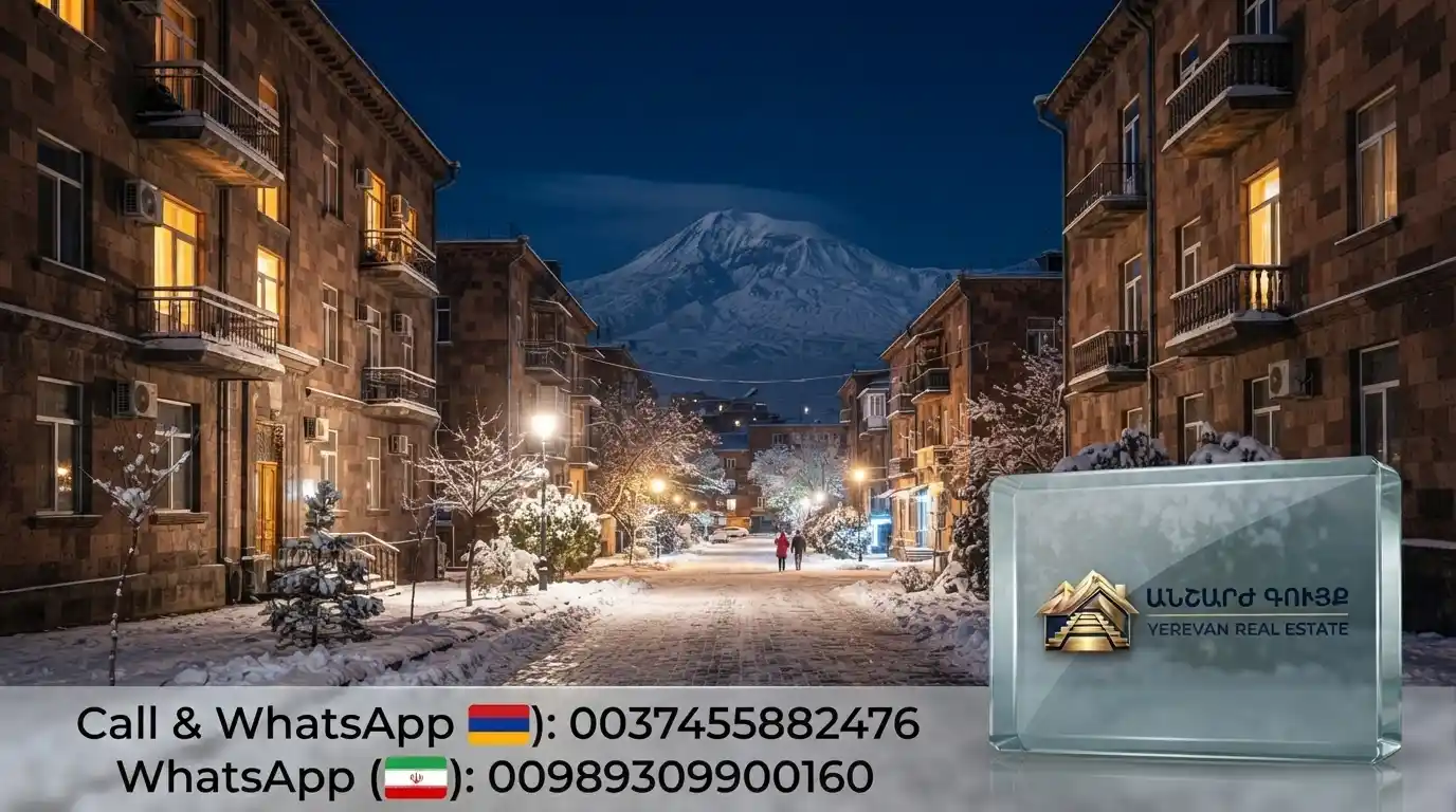 Snow-covered street in Yerevan on a winter night with warm glowing lights and Mount Ararat